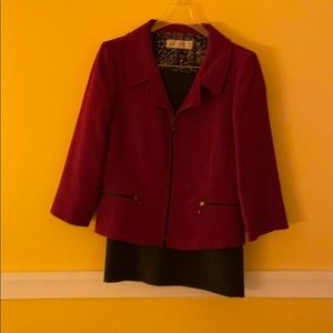 Maroon jacket and heather skirt set.